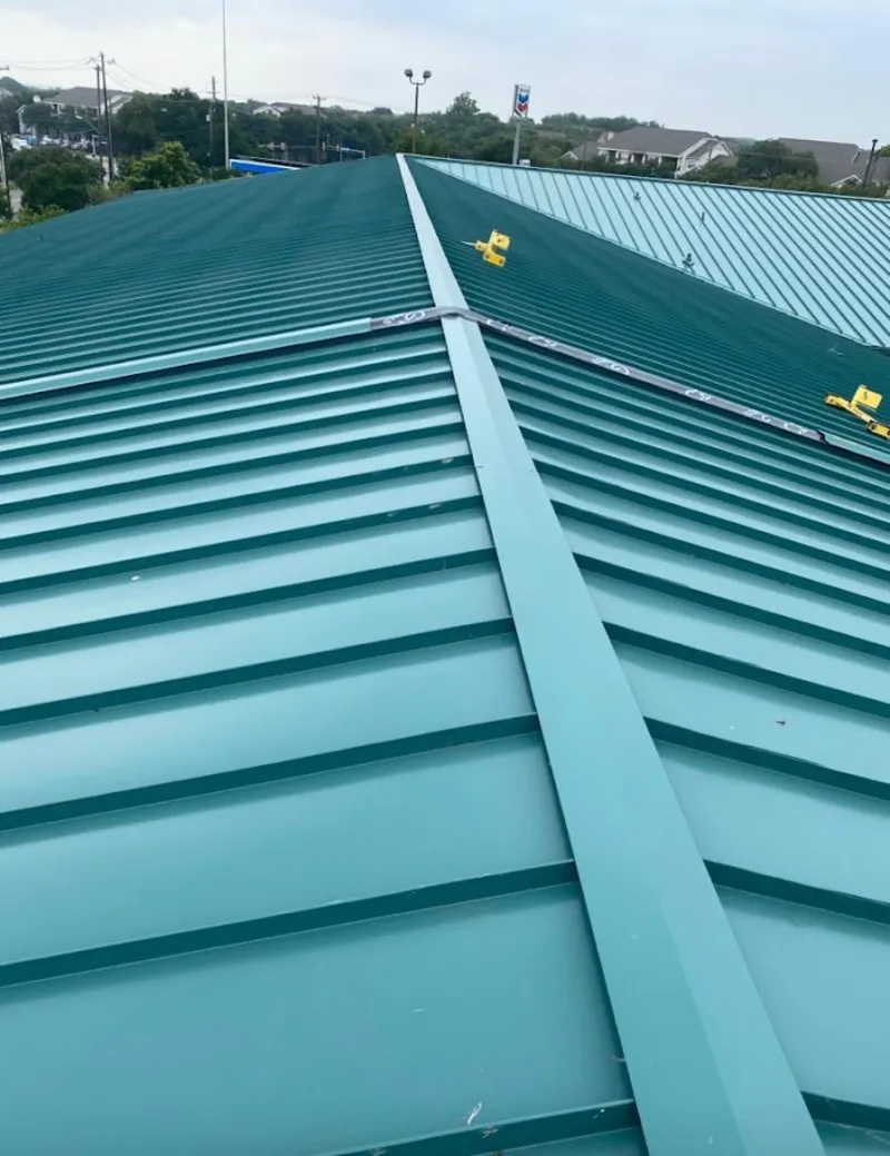 Green commercial metal roof ridge and valley for Metal Roof Repair in Westchase